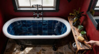A Tiny Bathroom Went From Grimy To Cozy After A "Gothic-Aquatic" Redo
